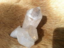Load image into Gallery viewer, Quartz crystal point with stand up cut base