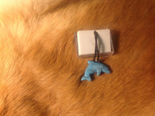 Load image into Gallery viewer, Carved stone dolphin necklace.  Made of turquoise.