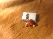 Load image into Gallery viewer, Carved red jasper dolphin necklace.