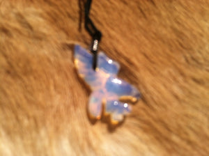 Carved stone eagle necklace.  Made of Opalite.