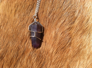 Amethyst crystal wire wrap with sterling silver chain.