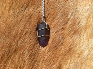 Amethyst crystal wire wrap with sterling silver chain.