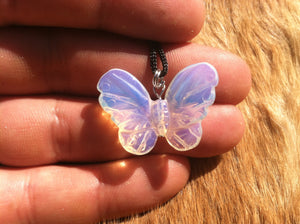 Carved stone butterfly necklace.  Made of opalite.