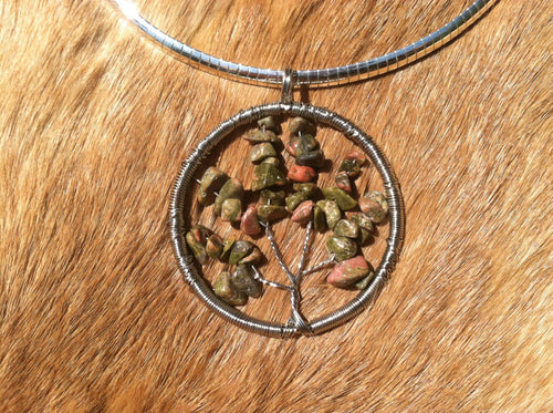 Tree of life wire wrapped pendent made with real tumbled unakite. With wide sterling silver chain.