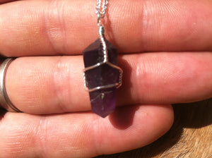 Amethyst crystal wire wrap with sterling silver chain.