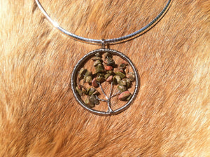 Tree of life wire wrapped pendent made with real tumbled unakite. With wide sterling silver chain.