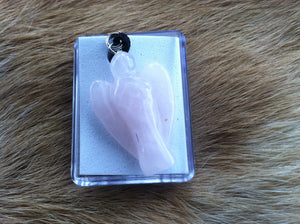 Carved stone Angel necklace.  Made of Rose Quartz