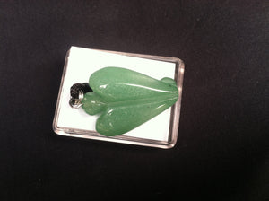 Carved stone Angel necklace.  Made of Jade