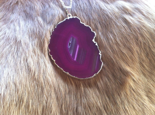 Pink agate geode with silver plated boarder necklace