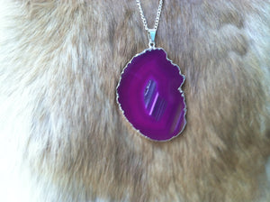 Pink agate geode with silver plated boarder necklace