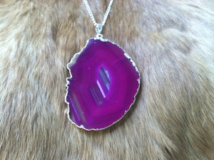 Pink agate geode with silver plated boarder necklace
